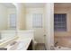 A well-lit bathroom featuring a vanity and a window at 3821 Rex Mill Sq, Rex, GA 30273