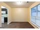 Bright dining room features a window and adjoins an open kitchen space at 3821 Rex Mill Sq, Rex, GA 30273