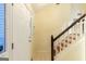 Front door and stairway view with newel post, tile flooring and lots of light at 3821 Rex Mill Sq, Rex, GA 30273