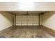 Clean two car garage featuring a smooth floor and plenty of space at 3821 Rex Mill Sq, Rex, GA 30273