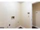 A utilitarian laundry room with connection points and vinyl flooring at 3821 Rex Mill Sq, Rex, GA 30273