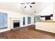 Spacious living room with vaulted ceilings and a fireplace, filled with natural light at 3821 Rex Mill Sq, Rex, GA 30273