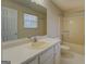 Bathroom featuring neutral countertops, a sink, and combined shower and bathtub at 440 Cottonpatch Rd, Lawrenceville, GA 30046