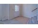 Bright entryway featuring tile flooring, neutral walls, and a staircase at 440 Cottonpatch Rd, Lawrenceville, GA 30046