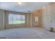 Spacious living room with carpet, natural light, neutral walls, and an entryway at 440 Cottonpatch Rd, Lawrenceville, GA 30046