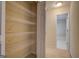 Walk-in closet offering metal wire racking for storage with access to the connected bathroom at 440 Cottonpatch Rd, Lawrenceville, GA 30046