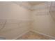 Spacious walk-in closet with ample shelving for organized storage solutions at 440 Cottonpatch Rd, Lawrenceville, GA 30046