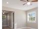 Comfortable bedroom with ceiling fan and natural light from the windows at 650 Moseley Rd, Stockbridge, GA 30281