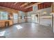 Large bonus room with two doors, wood accents, and windows at 650 Moseley Rd, Stockbridge, GA 30281