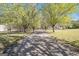 Long driveway with mature trees at 650 Moseley Rd, Stockbridge, GA 30281