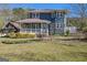 Charming two-story home with a welcoming front porch and a well-maintained, traditional style in a beautiful country setting at 650 Moseley Rd, Stockbridge, GA 30281
