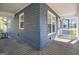View of a porch with blue siding and a wood deck at 650 Moseley Rd, Stockbridge, GA 30281