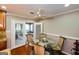 Cozy dining area adjacent to the kitchen with a glass table and comfortable seating at 3798 Cumberland Way, Lithonia, GA 30038