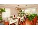 Open dining area with modern table, chairs, and bright natural light at 3798 Cumberland Way, Lithonia, GA 30038