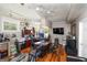 Bright home office with wood flooring, multiple workstations, and a walkout door at 3798 Cumberland Way, Lithonia, GA 30038