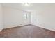 Bedroom featuring a neutral wall color and carpet flooring at 4967 Post Road Pass, Stone Mountain, GA 30088