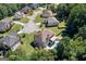 Aerial view of a beautiful home with large in-ground swimming pool in a well-maintained neighborhood at 3015 Gold Creek Dr, Villa Rica, GA 30180