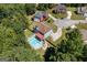 Aerial view of a home with a pool, deck, and a well-manicured lawn and landscaping at 3015 Gold Creek Dr, Villa Rica, GA 30180