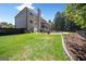 House backyard with green grass and a fence surrounding the backyard at 3015 Gold Creek Dr, Villa Rica, GA 30180