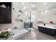 Modern bathroom with a soaking tub, glass-enclosed shower, and stylish fixtures at 3015 Gold Creek Dr, Villa Rica, GA 30180