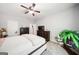 Relaxing bedroom featuring a ceiling fan, large windows, and ensuite bathroom at 3015 Gold Creek Dr, Villa Rica, GA 30180