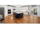 Open kitchen features a large island, stainless steel appliances, and ample cabinet space, flowing into an adjacent dining area at 3015 Gold Creek Dr, Villa Rica, GA 30180