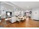 Open-concept living and dining area with hardwood floors and elegant decor at 3015 Gold Creek Dr, Villa Rica, GA 30180