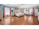 Spacious main bedroom suite featuring tray ceilings, ensuite bath, and ample sunlight at 3015 Gold Creek Dr, Villa Rica, GA 30180