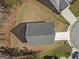 Aerial view of the roof of the house, backyard, and cul-de-sac street at 105 Creekside Knl, Grantville, GA 30220