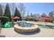 Luxury backyard pool with stone hot tub, and plenty of space for lounging at 341 Beaumont Farms Dr, Sharpsburg, GA 30277