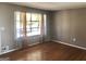 Cozy living room features hardwood floors, neutral wall colors, and ample natural light at 4572 Sahara Sw Dr, Atlanta, GA 30331