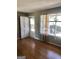 Bright living room featuring hardwood floors, natural light, and neutral wall colors at 4572 Sahara Sw Dr, Atlanta, GA 30331
