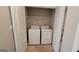 Laundry area with white washer and dryer units at 2780 Laurel Ridge Cir, East Point, GA 30344