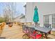Backyard deck with outdoor seating and grill, great for entertaining near the lake at 306 Turtle Pointe Dr, Carrollton, GA 30116