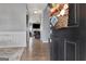 Inviting foyer with hardwood floors and a view into the living area with a fireplace at 306 Turtle Pointe Dr, Carrollton, GA 30116