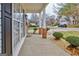 Inviting covered front porch, perfect for relaxing and enjoying the neighborhood views at 306 Turtle Pointe Dr, Carrollton, GA 30116