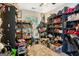 Spacious walk-in closet with custom shelving, providing ample storage for shoes and handbags at 10119 Azalea Dr, Covington, GA 30014
