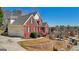 Beautiful brick home with an attached garage, manicured lawn, and great curb appeal at 10119 Azalea Dr, Covington, GA 30014