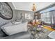 Comfortable living room with neutral decor, plush seating, and ample natural light at 10119 Azalea Dr, Covington, GA 30014