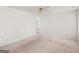 This bedroom has neutral walls and carpet with access to the en-suite bathroom at 290 Rocky Branch Dr, Mcdonough, GA 30252