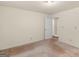Neutral bedroom with view to another room through the doorway at 290 Rocky Branch Dr, Mcdonough, GA 30252