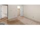 Bedroom with neutral carpet and view through the doorway at 290 Rocky Branch Dr, Mcdonough, GA 30252