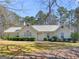 Charming single-story home with manicured front yard and inviting entrance at 290 Rocky Branch Dr, Mcdonough, GA 30252