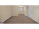 Bedroom featuring plush carpet, neutral paint, and a window offering natural light at 2389 Aukerman Trce # 79, Hampton, GA 30228