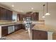 Modern kitchen featuring stainless steel appliances, granite countertops, and ample cabinet space at 2389 Aukerman Trce # 79, Hampton, GA 30228