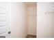 Walk-in closet showcasing carpeted flooring and wire shelving for storage at 443 Faulkner St, Stockbridge, GA 30281