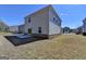 Backyard with patio and lawn at 1659 Hay Patch Ln, Loganville, GA 30052
