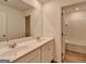 Elegant bathroom with double vanity, modern fixtures, and a bright, spacious design at 1659 Hay Patch Ln, Loganville, GA 30052