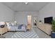 Comfortable bedroom features neutral decor and a ceiling fan at 1659 Hay Patch Ln, Loganville, GA 30052