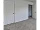 Cozy bedroom with neutral carpeting, a closet, and white walls at 1659 Hay Patch Ln, Loganville, GA 30052